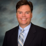 Headshot of John Thompson